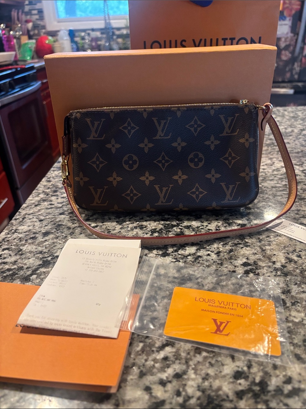 Louis Vuitton Monogram Wristlet Clutch in Brown and Tan